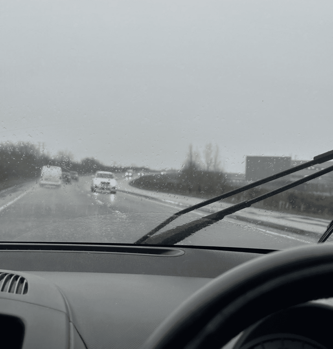 A lovely rainy driving day A raining scene of being behind the wheel on UK roads, with traffic coming the other way