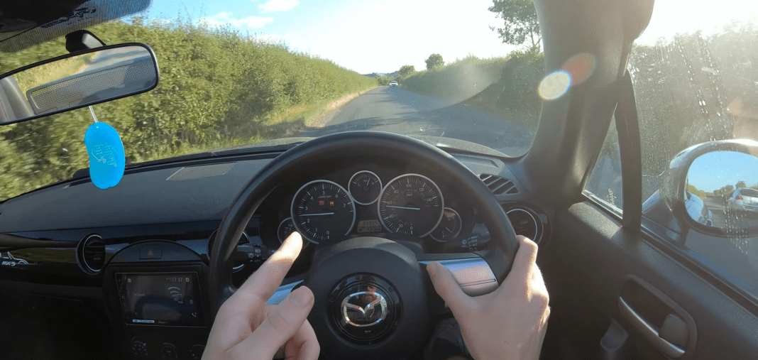 Screenshot 2026-02-11 122826 Behind the wheel of a 2006 MX5 on a sunny day