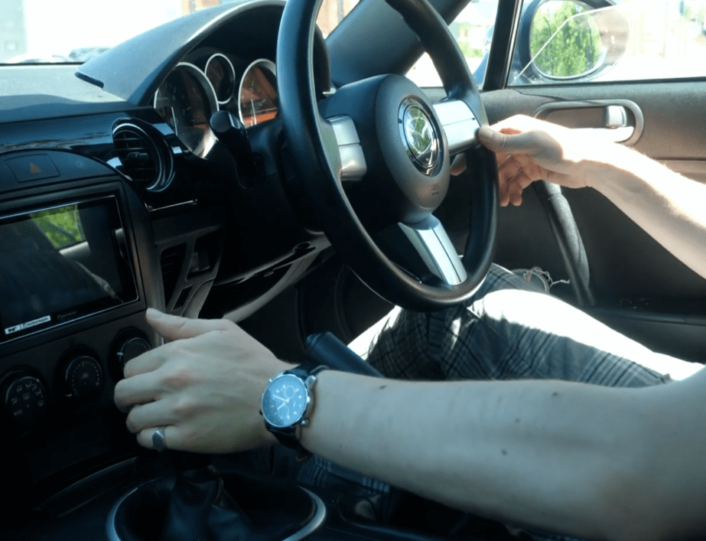 Sat in a Mazda MX5 whilst Paynos talks about car insurance